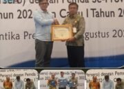 Pemerintah Kabupaten Pesawaran Terima Penghargaan Peringkat III Atas Kinerja Dalam Ketepatan Penyetoran IWP Serta Pembayaran JKK dan JKM se-Provinsi Lampung